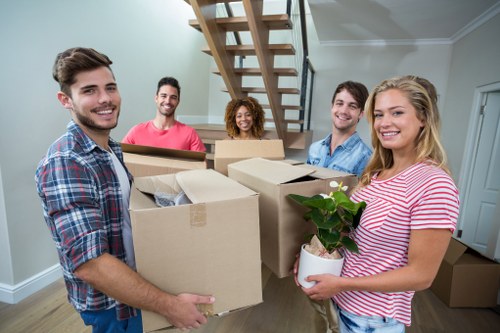 Furniture and boxes prepared for a West Kensington move