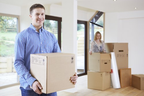 Careful loading of household items for a local move in West Kensington