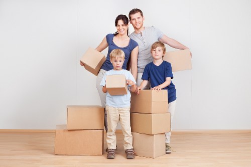 Packed boxes and furniture ready for a West Kensington home removal
