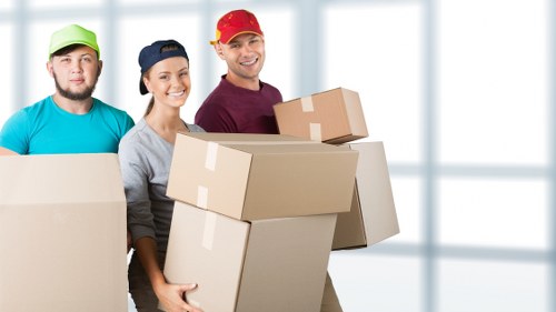 Professional movers handling a flat relocation in West Kensington