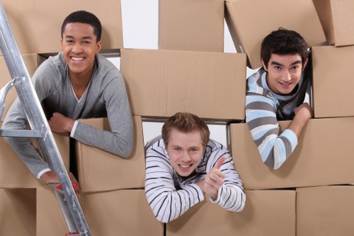 Local crew removing office furniture from a West Kensington business property