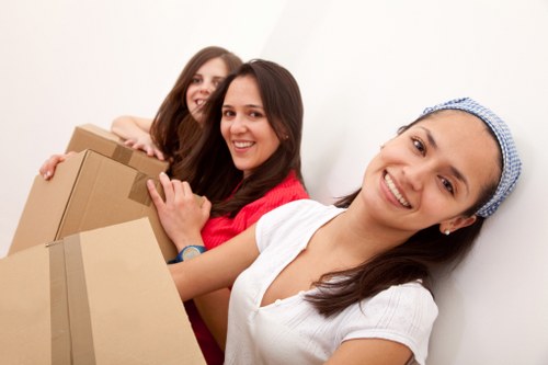 Packed office boxes and equipment ready for a commercial relocation