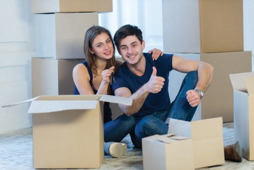 Boxes and furniture prepared for a local home removal service in West Kensington