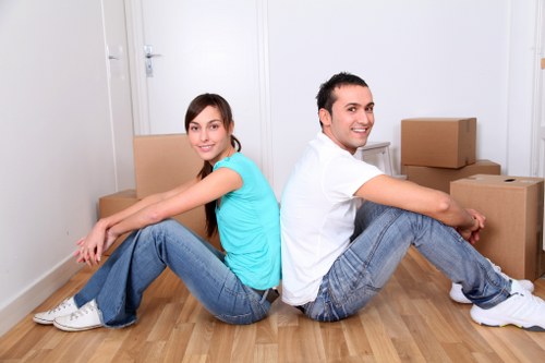 Careful handling of belongings during a flat move in West Kensington
